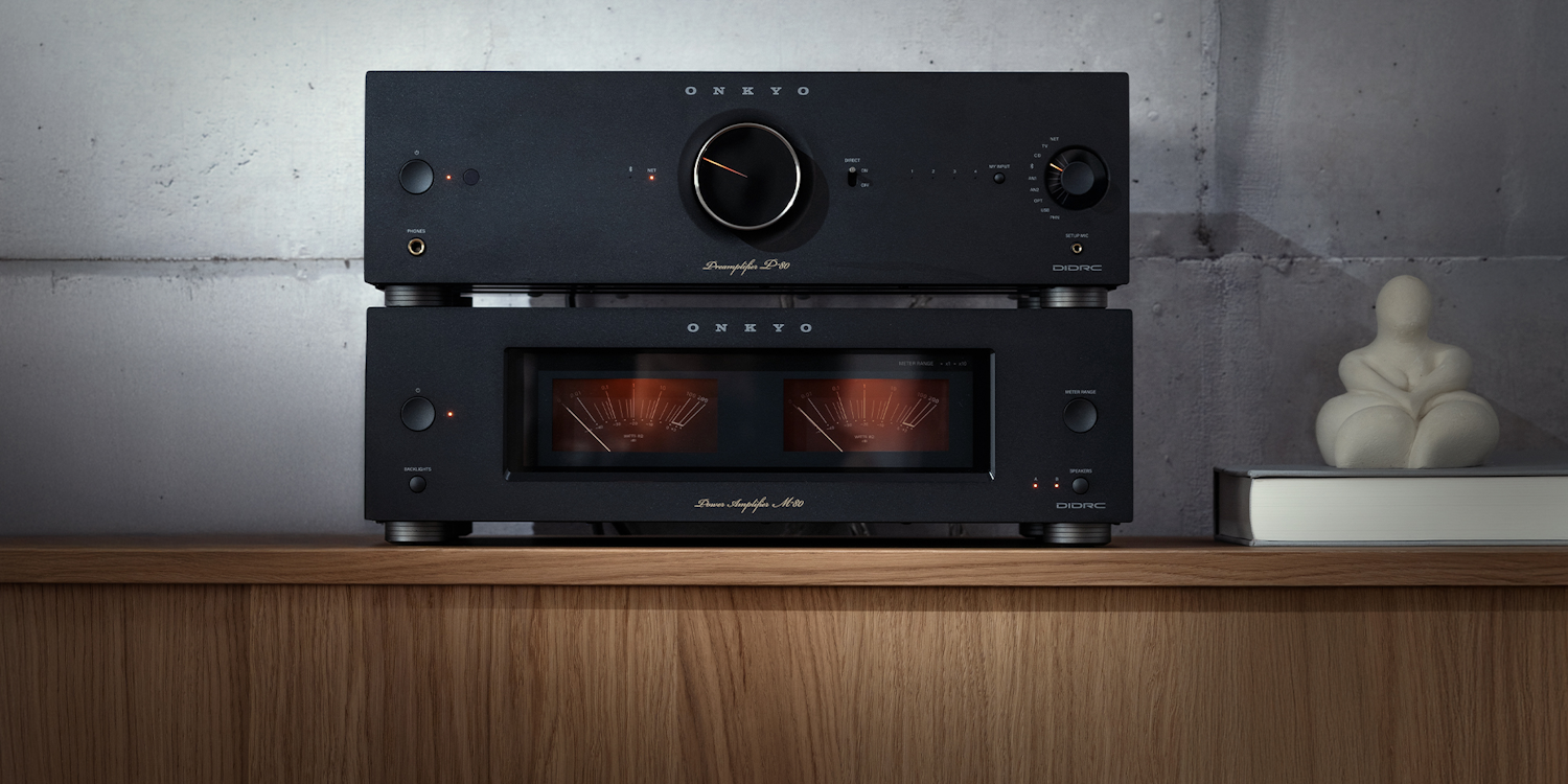 Onkyo Icon P 80 and M 80 black stacked beside small marble sculpture in listening room v02 2000x1000