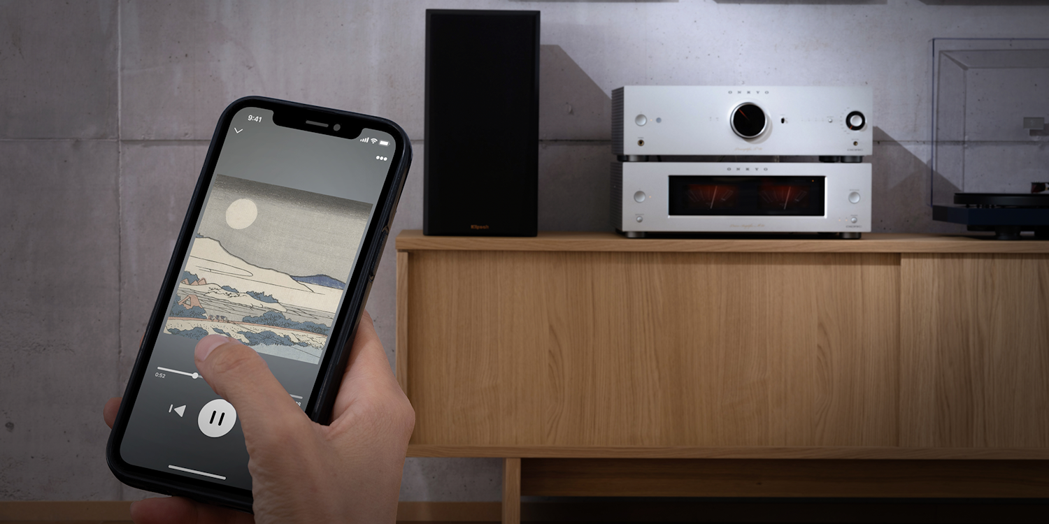 Onkyo Icon P 80 M 80 with phone controlling music in foreground 2000x1000